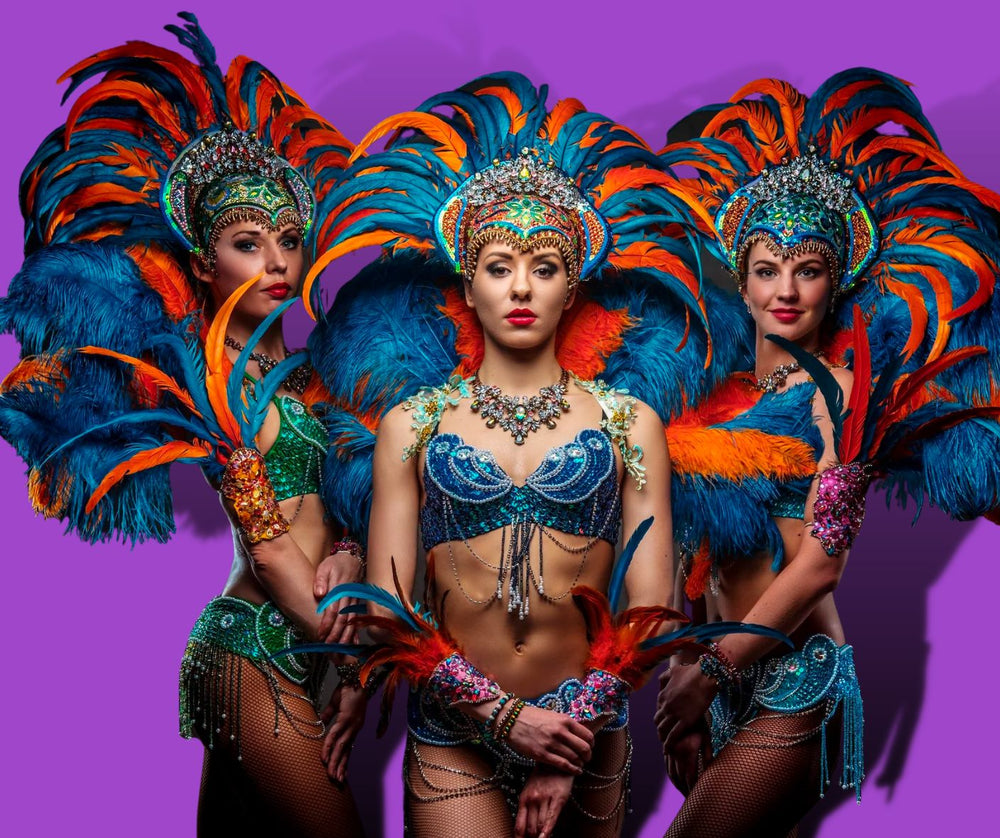 3 women in beautiful multi color ostrich feathers